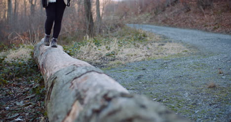 female tourist walking in mountain trail 1