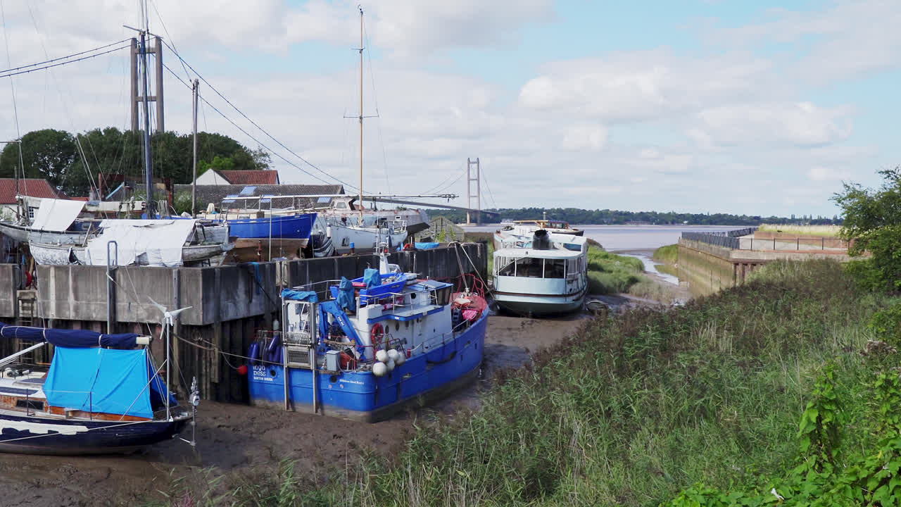 Humber Bridge aerial video: river, traffic, Lincolnshire to Humberside