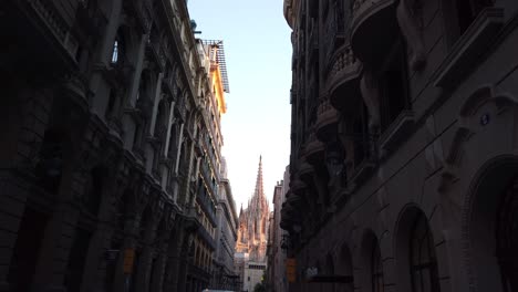 cathedral of barcelona gothic cathedral through a narrow street with skyline