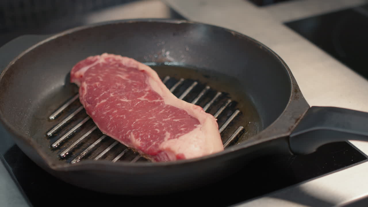 Cooking Beef Steak In Grilled Pan