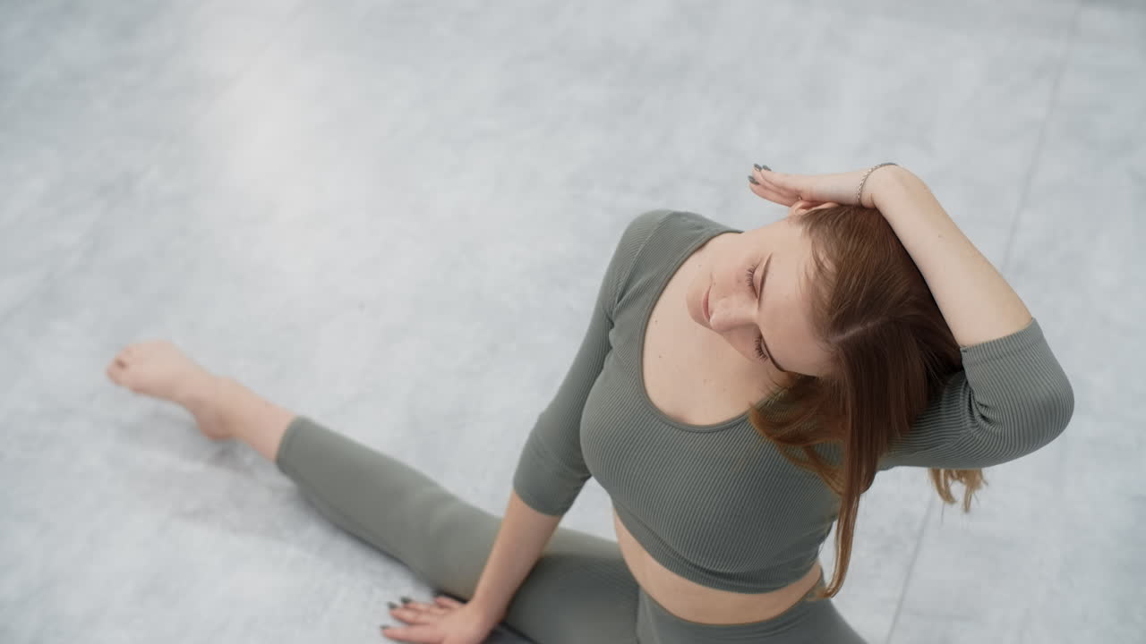 Woman Stretching in a Split