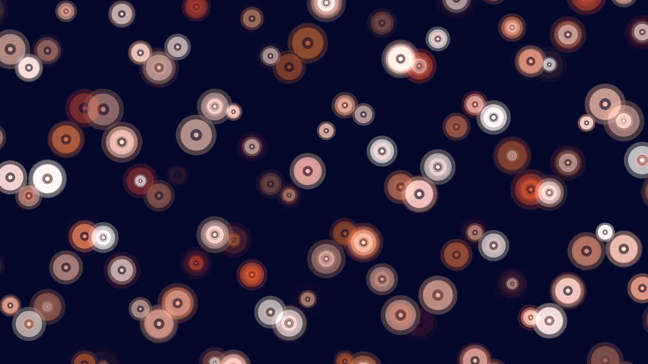 A vivid image showcasing a collection of green circles on a dark backdrop. The circles are randomly positioned, some overlapping, creating an engaging and lively visual pattern