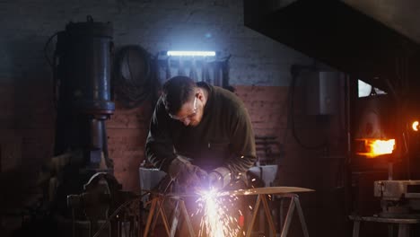 metalworker welding in a workshop