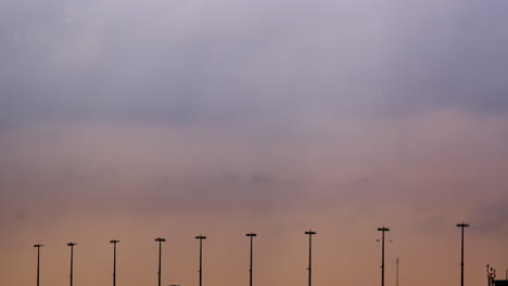 airplane taking off at sunset