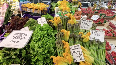 colorful display of vegetables at a busy market