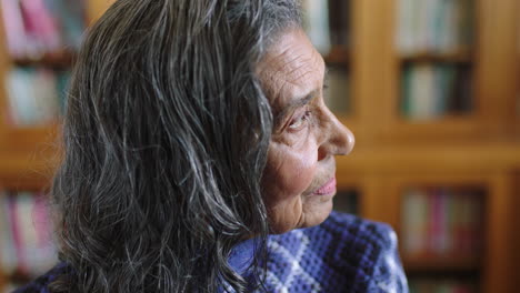 Thinking,-retirement-and-senior-woman-in-library