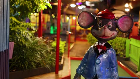 a cheerful animated mouse character in a colorful, illuminated miniature golf setting. bright lighting and vivid colors create a playful atmosphere