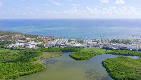 Freshwater-Lake-Of-Laguna-Bavaro-Wildlife-Refuge-And-Picturesque-Beach-Scenery-In-Punta-Cana,-Dominican-Republic