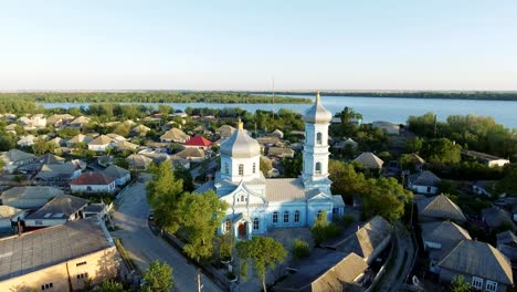 aerial footage of vilkovo city center - top view of church in summer, odessa region, ukraine