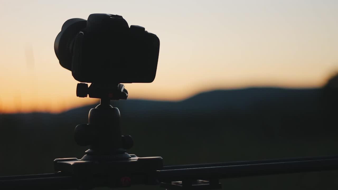 Camera On Slider Shooting Timelapse Of Sunrise Tight Shot Cinematic HD Gimbal Shot