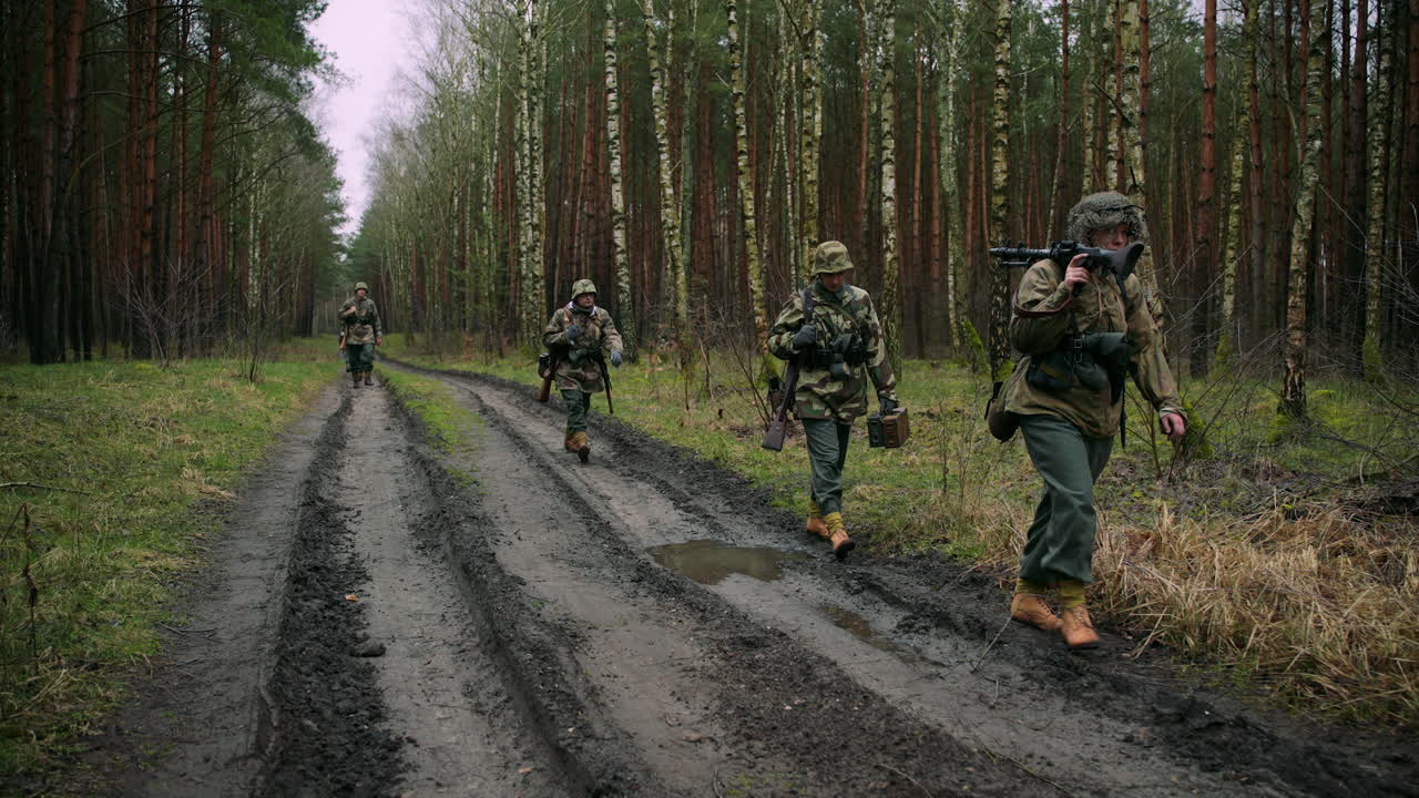 WWII German Soldiers Marching Through Forest
