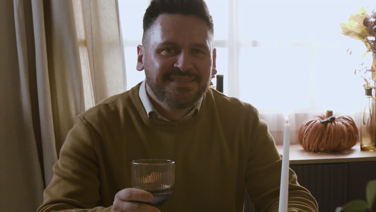 Man with Candle and Pumpkin