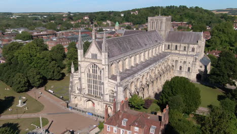 drone shot of winchester cathedral captured in summer in hampshire, uk