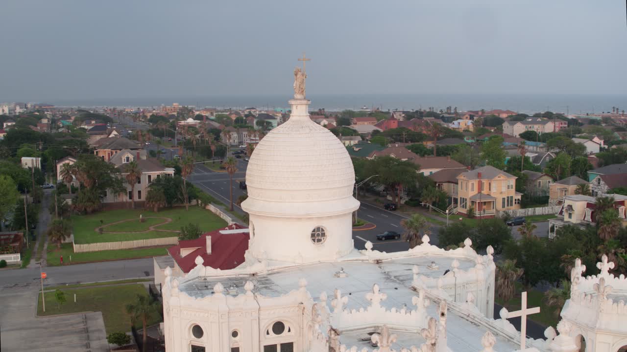 Drone view of Statue on top of the Sacred Heart Catholic Church in Galveston, Texas
