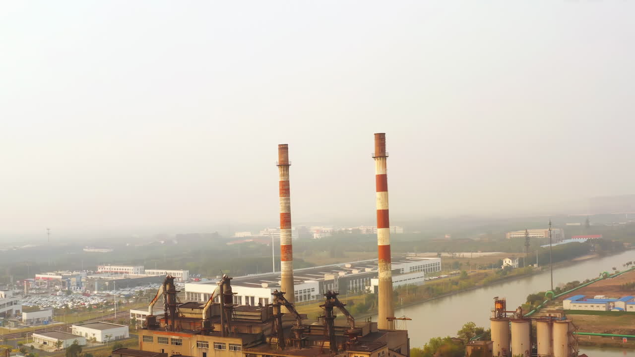 Aerial View of Industrial Factory and Smokestacks