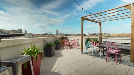 garden shared open roof lounge terrace with beautiful sky backdrop