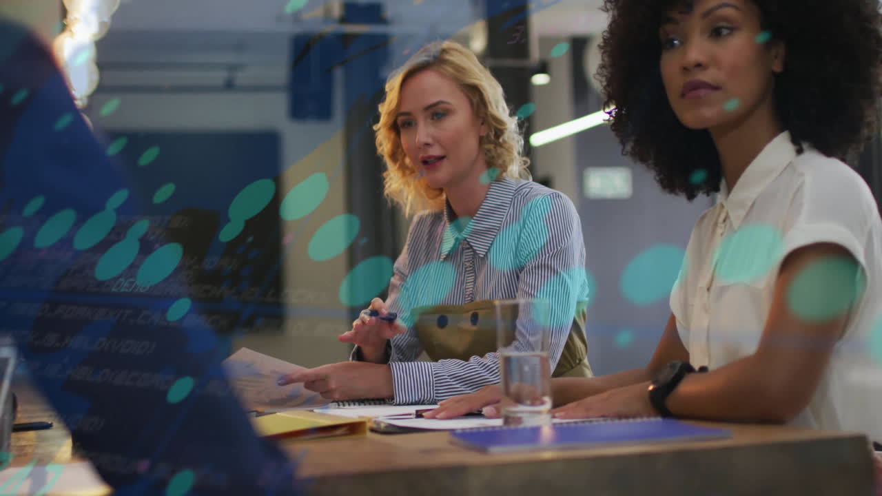Animation of graphs and changing numbers over diverse coworkers discussing reports in office