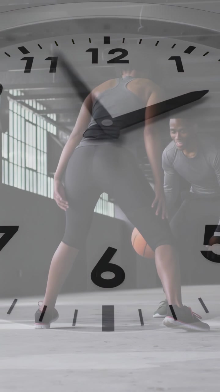 Vertical video: Woman in sports drill as defender steps, dribbling ball with rotating clock overlay