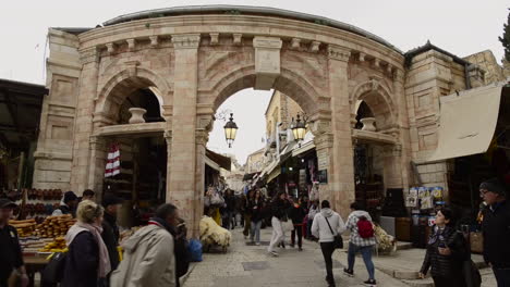 entrance arch to one of many alleys of the ancient old market city of jerusalem, israel. judish culture