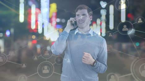 Animation-of-caucasian-businessman-talking-on-smartphone-and-network-of-connections-over-cityscape