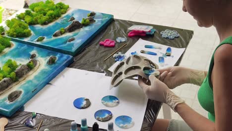 resin art project: creating island-themed coasters and jewelry