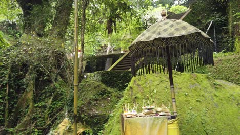 inside balinese forest temple, green stone architecture in the jungle bali indonesia, pura mengening tampaksiring