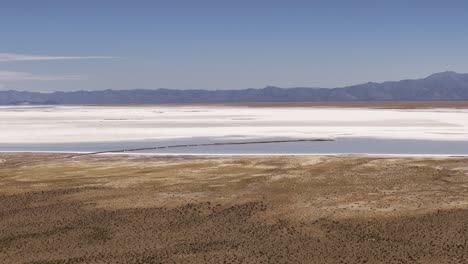 Aerial-Drone-Push-Toward-Causeway-In-The-Salinas-Grandes-of-Jujuy-and-Salta-Provinces,-Argentina