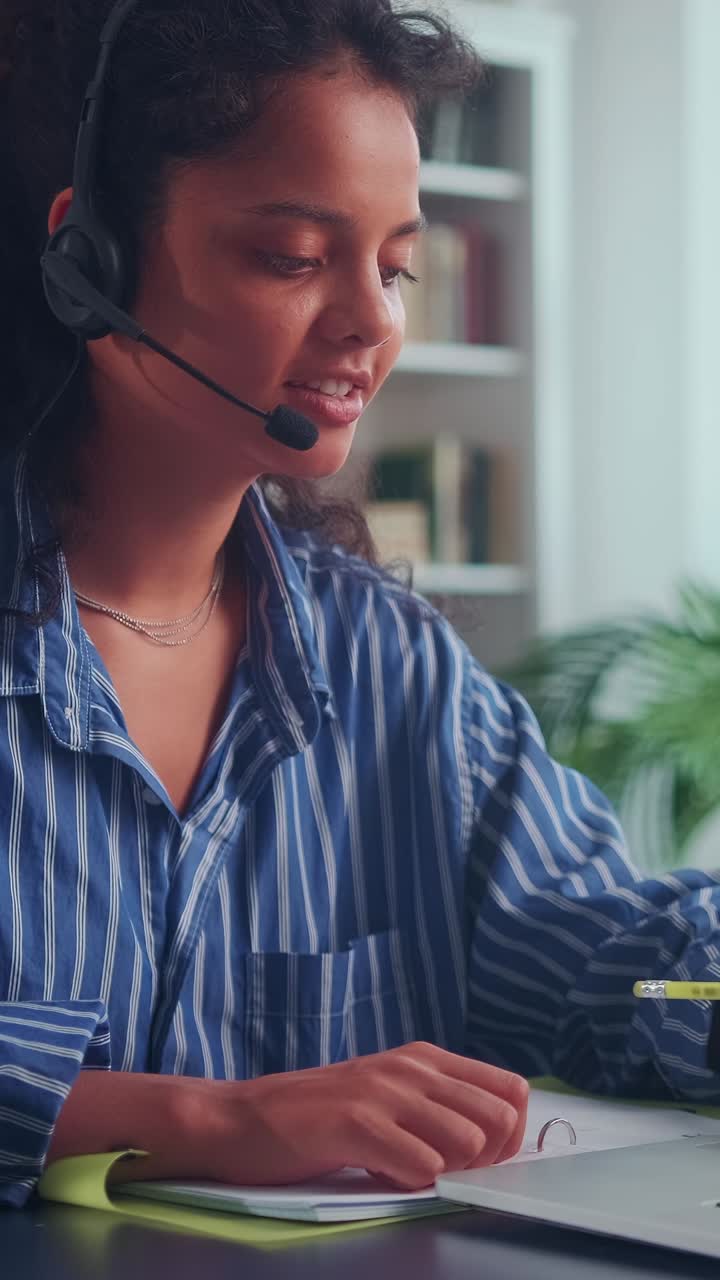 Indian professional engages in virtual work during a sunny afternoon
