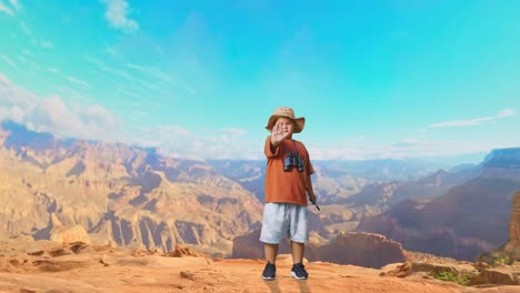 asian boy with a hat and binoculars using the magnifying glass, shaking head waving hand showing no gesture while traveling at the top of mountain. boy researcher, travel tourism adventure, full body