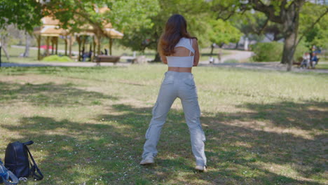 woman dancing in a park