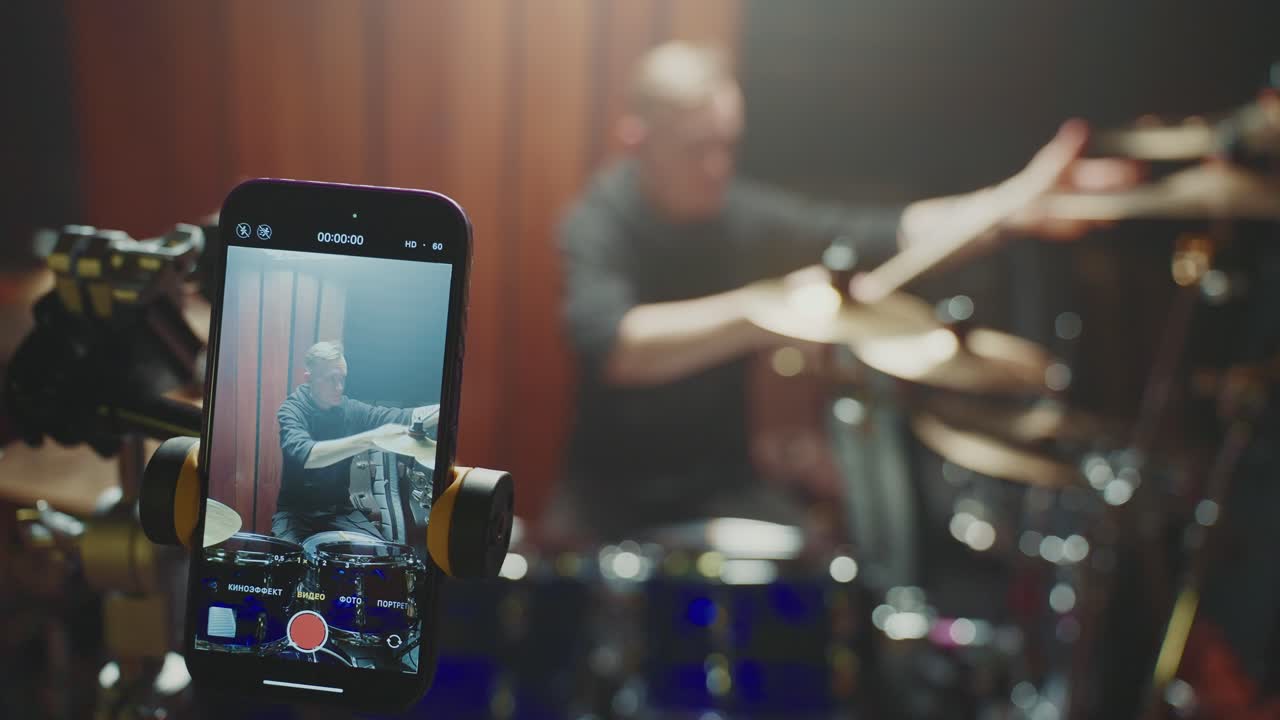 Drummer practicing and recording a session