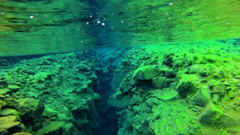 underwater diving snorkeling footage following the mid atlantic ridge fissure in thingvellir iceland 5