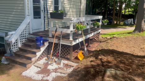 Progress-on-some-yard-work,-stone-foundation,-and-porch