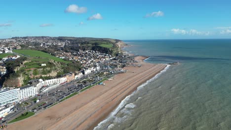 aerial drone shot of hastings uk, high wide angle shot of beach, old town and east hill cliffs