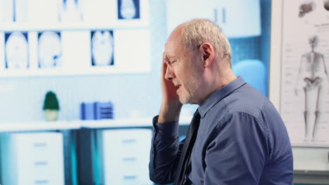 vertical video female doctor in a clinic evaluates a man cognitive function and reflex