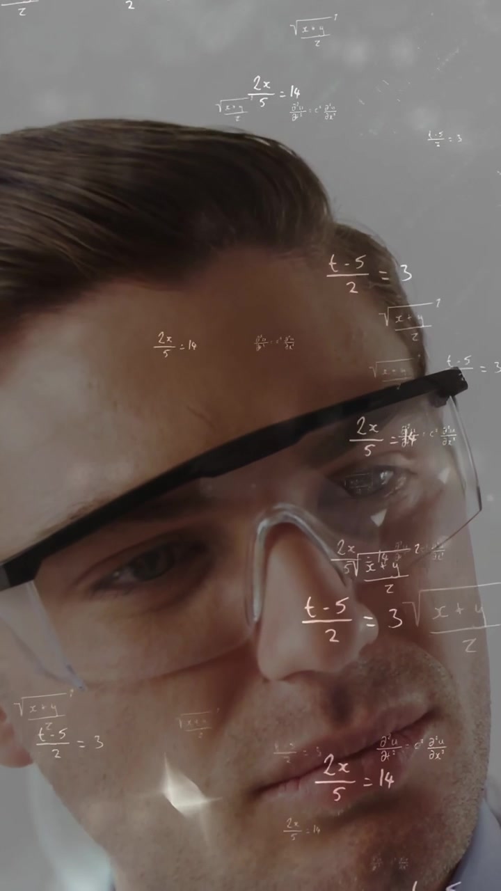 Vertical video: Researcher in goggles scanning math equations overlaying face for analyzing data