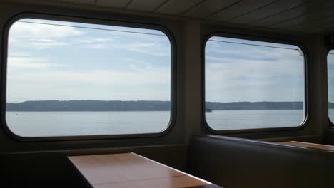 moving shot of empty booths on the whidbey island ferry