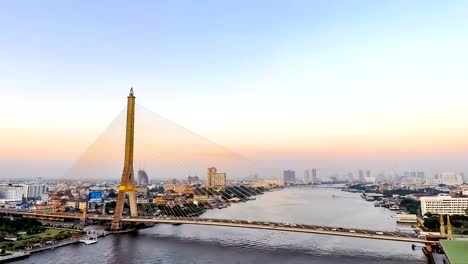 aerial timelapse video for rama viii bridge with sunset