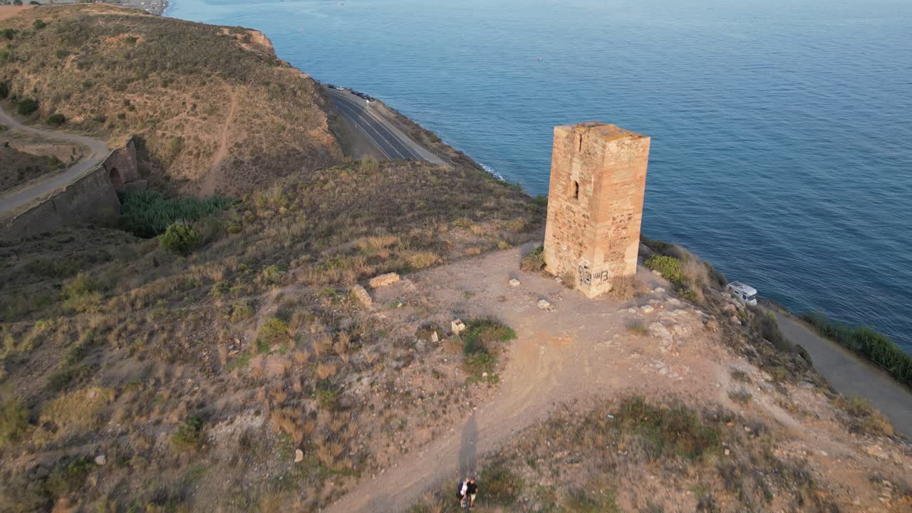 Experience the historic Tower of Jaral in Almayate Bajo from a mesmerizing drone's-eye view