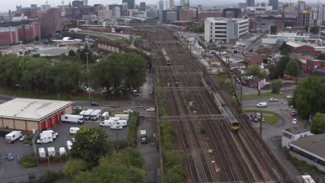 drone shot tracking train near manchester piccadilly station 03