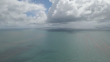 Cumulus-Clouds-Over-The-Tranquil-Waters-Of-Coral-Sea-From-Yeppoon-In-QLD,-Australia