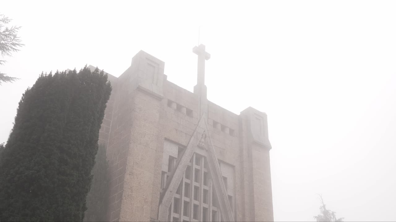 Sanctuary of Penha in Guimarães Portugal shrouded in thick morning fog