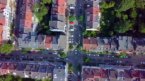 bird's eye view on roofs of traditional houses and urban streets in bremen, germany - aerial drone shot