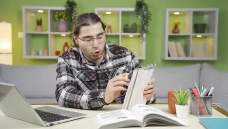 Young-college-student-working-remotely-online.