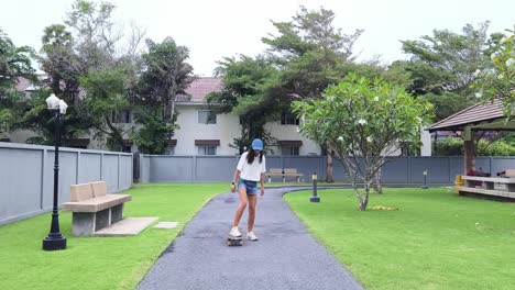 woman skateboarding in a park