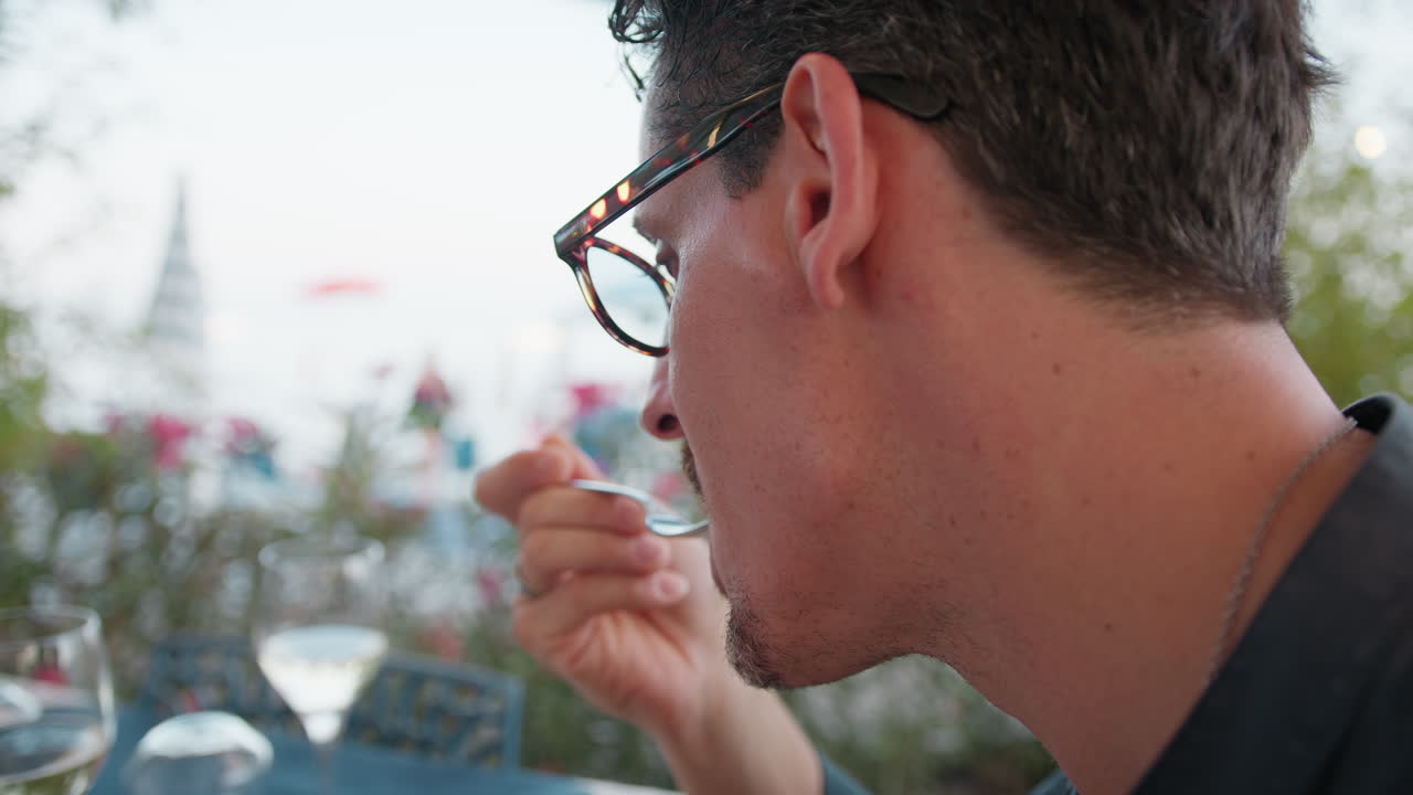Man Savouring A Gourmet Tuna Dish At The Beach Resort For Lunch