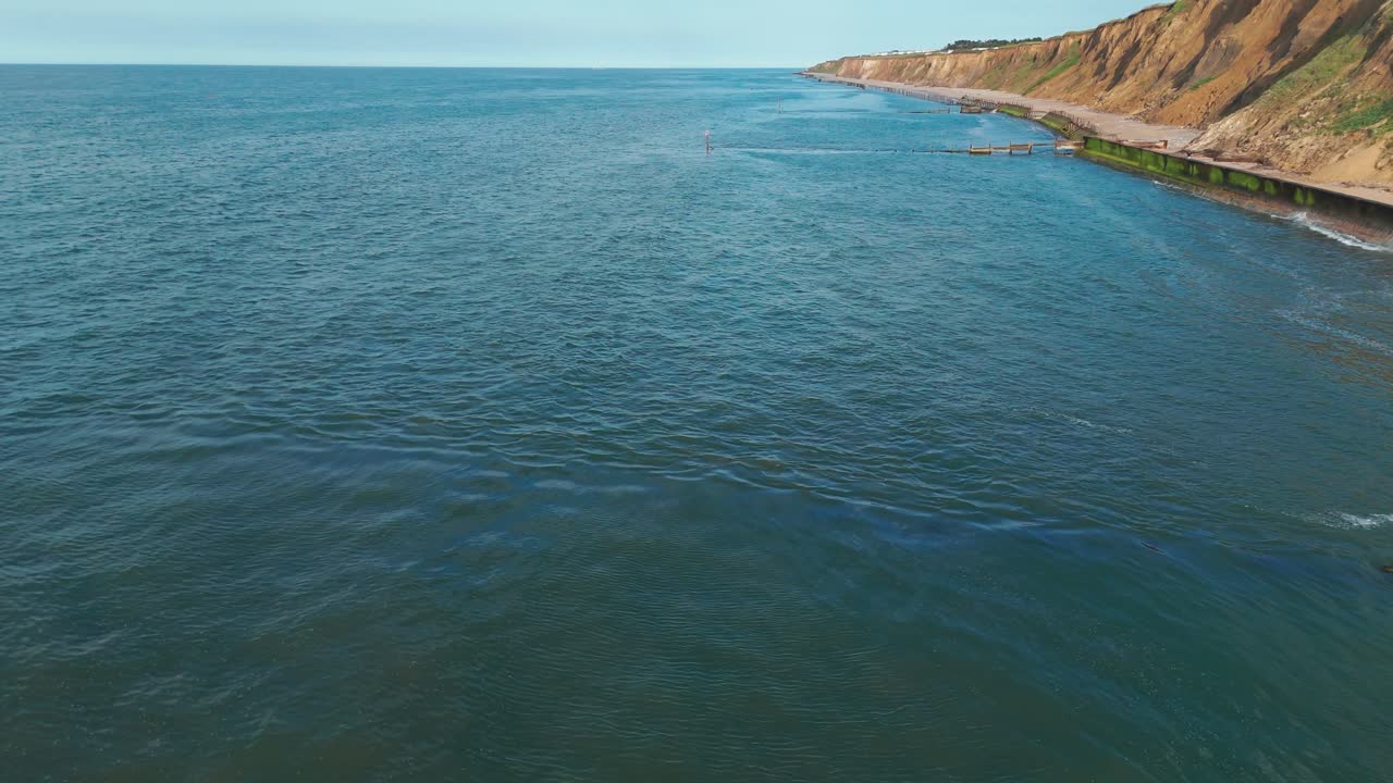 English coastline beach rocky cliffs landscape aerial drone Sheringham United Kingdom