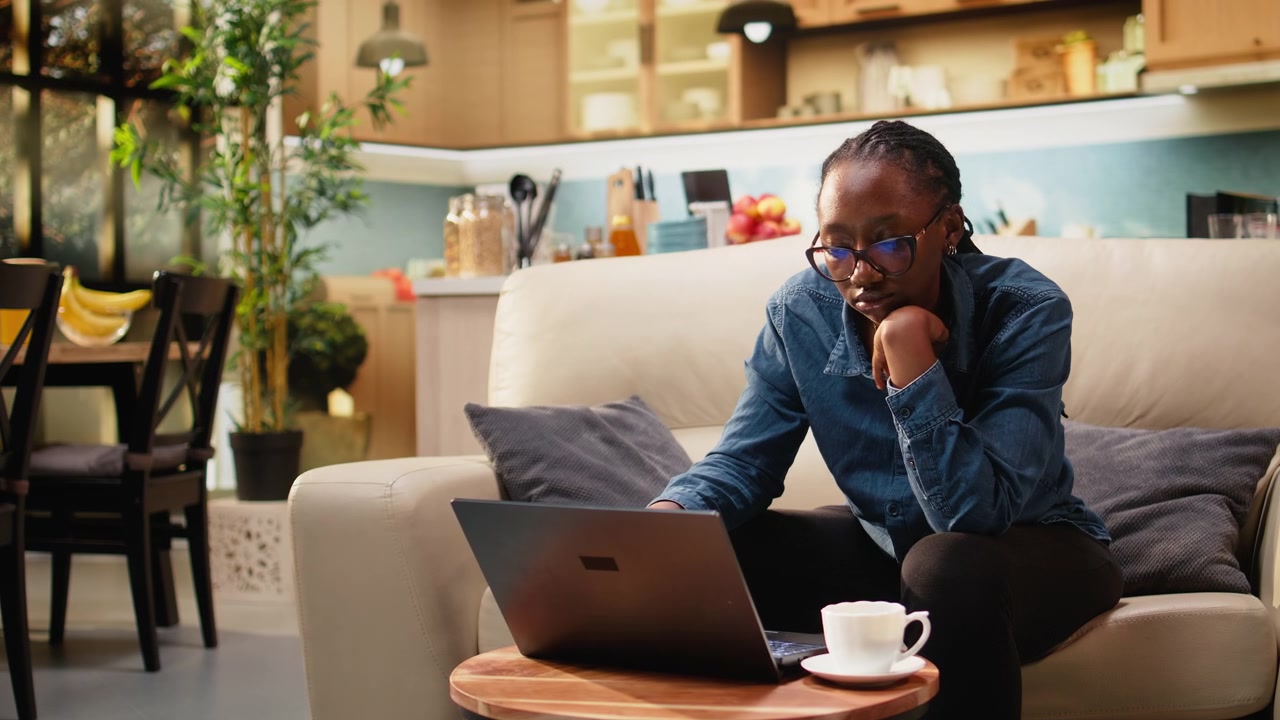 Demotivated dull woman with low energy and lack of motivation at laptop