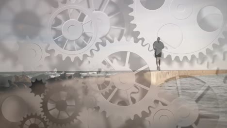 animation of cogs spinning over fit man running