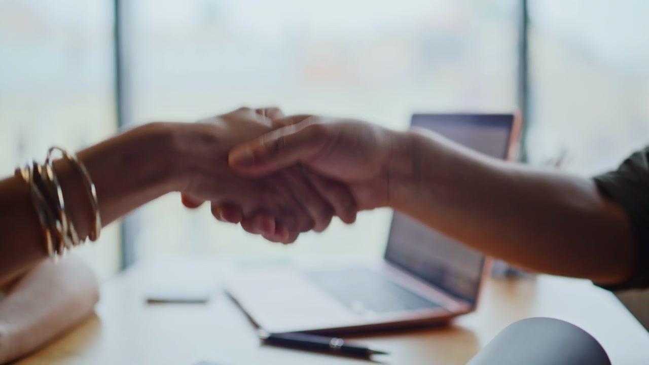 Business handshake close up office. Man woman making deal partnership agreement